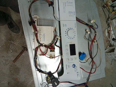 Вживаний модуль управління пральною машиною Indesit Prime зі стандартним замком.  21501163100 FW1: 46.06.18 FW2: 1.5.11 S/N: 1303604532 3875*E фото