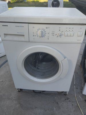 Б/У Розбирання пральної машини Siemens XS440.  Запчастини на пральну машину Siemens XS440.  Siemens XS440 за запчастинами 3218*E фото