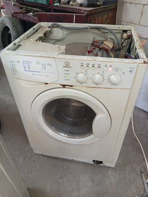 Вживані запчастини до пральної машини Indesit WIDL106 (з сушкою)   Розбирання пральної машини Indesit WIDL106 3933*E фото