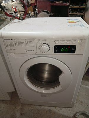 Вживані запчастини до пральної машини Indesit E2SE 2160.  Розбирання пральної машини Indesit E2SE 2160 3884*E фото