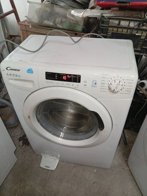 Вживані запчастини до пральної машини Candy CS34 1062D2.  Розбирання пральної машини Candy CS34 1062D2.  Candy CS34 1062D2 за запчастинами 4085*E фото