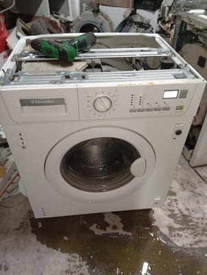 Вживані запчастини до пральної машини Electrolux EWG14550 W.  Розбирання пральної машини Electrolux EWG14550 W.  Electrolux EWG14550 W за запчастинами 3885*E фото