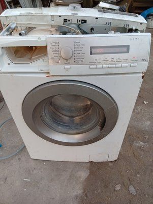 Вживані запчастини до пральної машини AEG L576272SL.  Розбирання пральної машини AEG L576272SL.  AEG L576272SL за запчастинами 3887*E фото