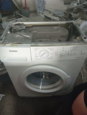 Вживані запчастини до пральної машини Siemens WXS8630E.  Розбирання пральної машини Siemens WXS8630E.  Siemens WXS8630E за запчастинами 3939*E фото