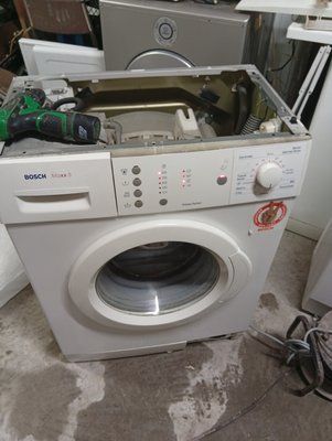 Вживані запчастини до пральної машини Bosch WLX16160.  Розбирання пральної машини Bosch WLX16160.  Bosch WLX16160 на запчастини 3963*E фото