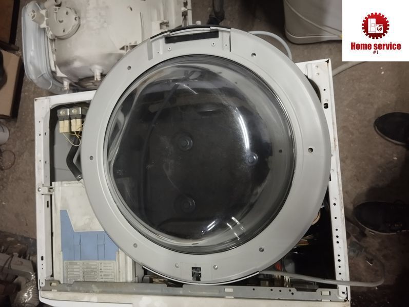 Б/У Люк на пральну машину Ariston rspg 723 та інші моделі 2534*E фото