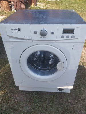 Б/У Розбирання пральної машини FAGOR 3F-3610 IT .  Запчастини на пральну машину FAGOR 3F-3610 IT.  FAGOR 3F-3610 IT по запчастинах 3385*E фото