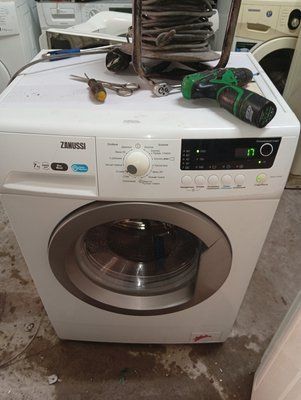 Вживані запчастини до пральної машини Zanussi ZWSH7100.  Розбирання пральної машини Zanussi ZWSH7100.  Zanussi ZWSH7100 за запчастинами 4148*E фото