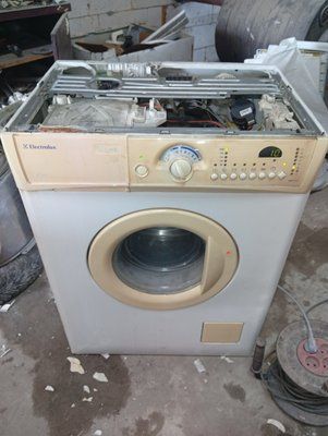 Вживані запчастини до пральної машини Electrolux EWS 1046.  Розбирання пральної машини Electrolux EWS 1046  Electrolux EWS 1046 за запчастинами 4102*E фото