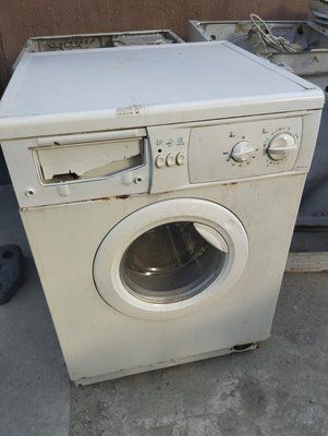 Б/У Розбирання пральної машини Indesit WG1031TX.  Запчастини на пральну машину Indesit WG1031TX 3146*E фото