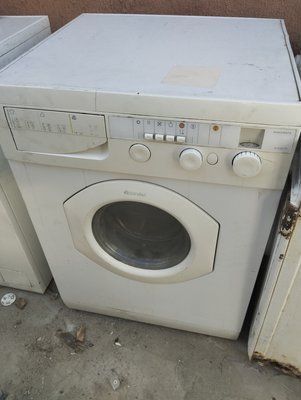 Б/У Розбирання пральної машини Ariston AL946CTX.  Запчастини на пральну машину Ariston AL946CTX 3148*E фото
